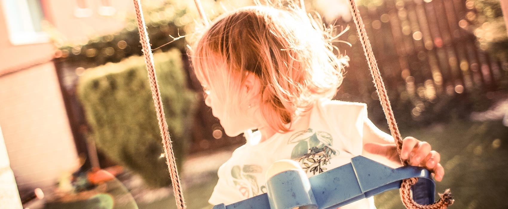 Young girl in a swing